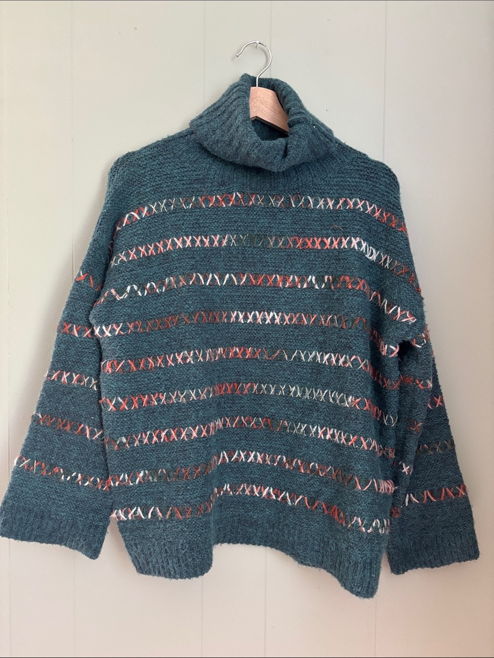 Molly Bracken Teal Turtleneck Sweater with Orange and white Stitch Accents
